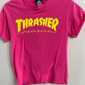 pink thrasher shirt with yellow writing